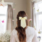 SPRING '24: Grace & Grandeur Bailee Satin Bow Barrette: Ivory