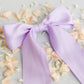 SPRING '24: Grace & Grandeur Bailee Satin Bow Barrette: Ivory