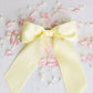 SPRING '24: Grace & Grandeur Bailee Satin Bow Barrette: Ivory