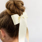 SPRING '24: Grace & Grandeur Bailee Satin Bow Barrette: Ivory